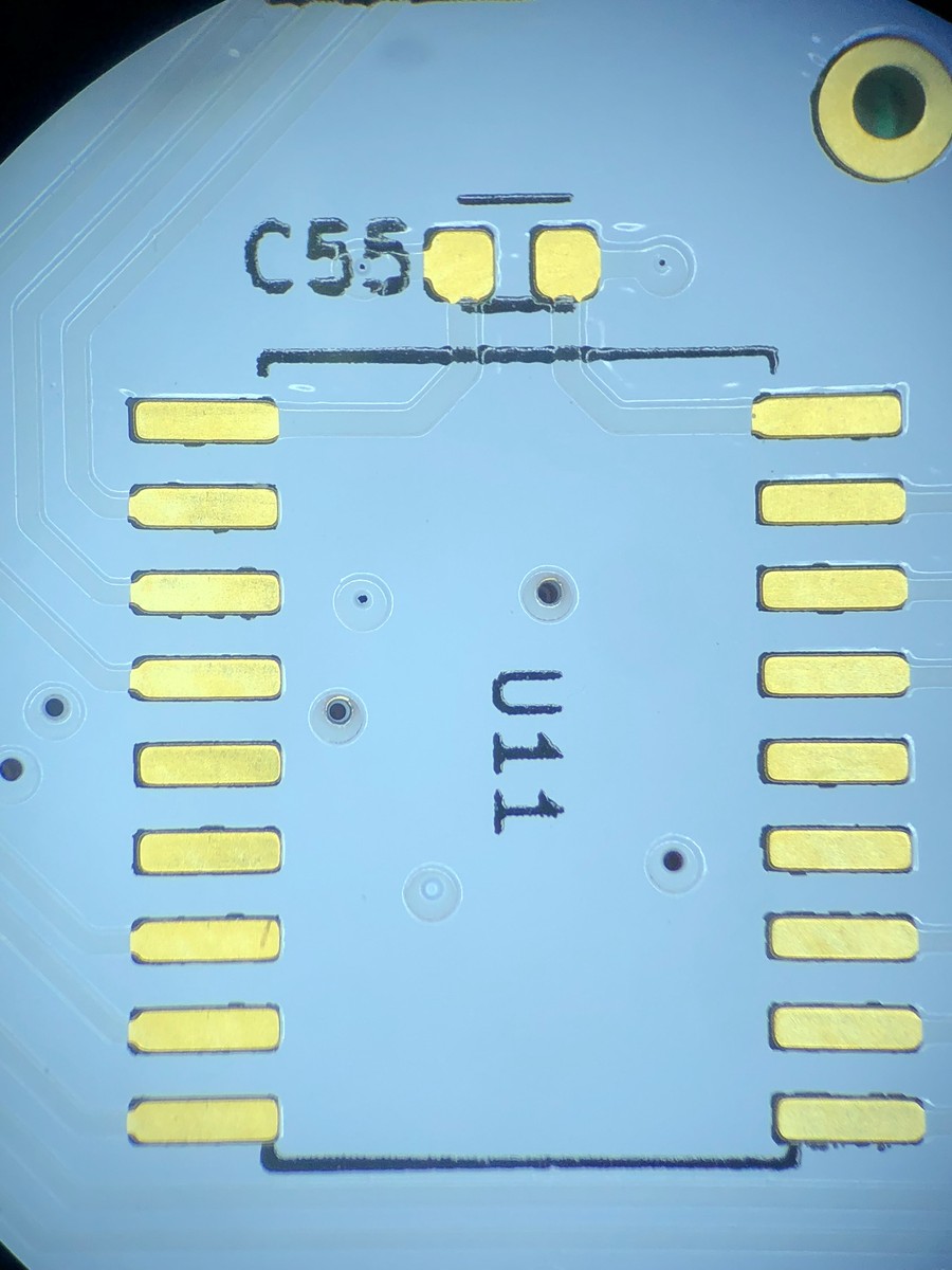 Bottom layer closeup showing slightly misalignment of drills and silkscreen