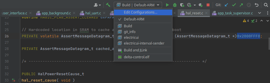 Run Configuration selector in the top bar, above the code window/tabs